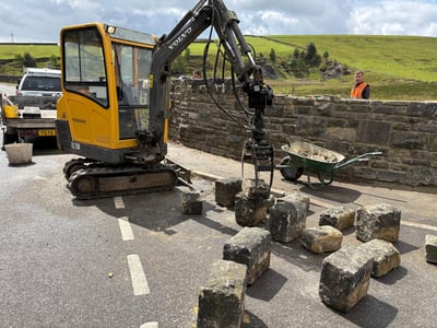 Professional insurance claim repair work on stone wall
